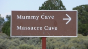 PICTURES/Canyon de Chelly - North Rim Day 2/t_Mummy & Massacre Cave Sign.JPG
